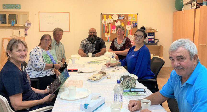 A picture of community members gathered for the Health Equity Consultation meeting