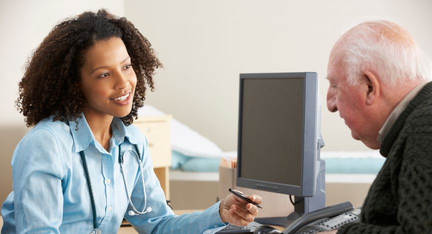 A picture of a female GP with a patient