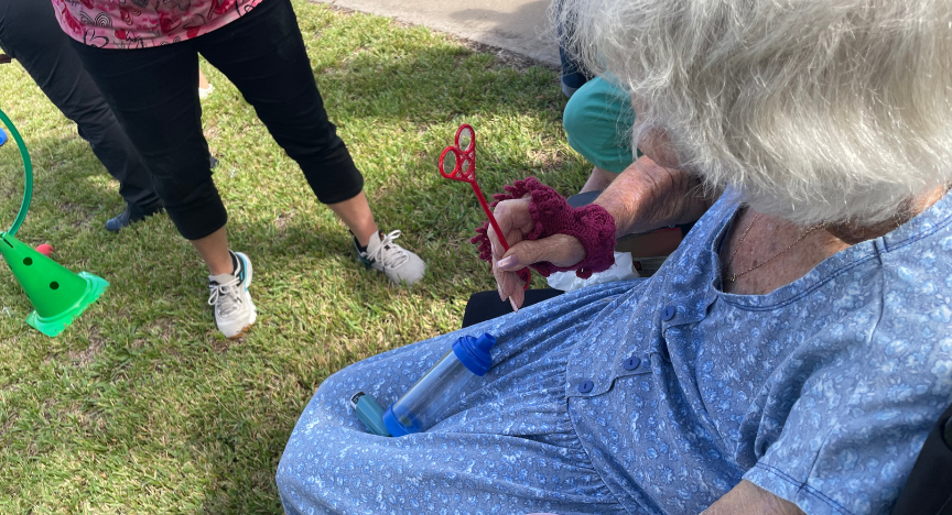 A picture of a person participating in playgroup.